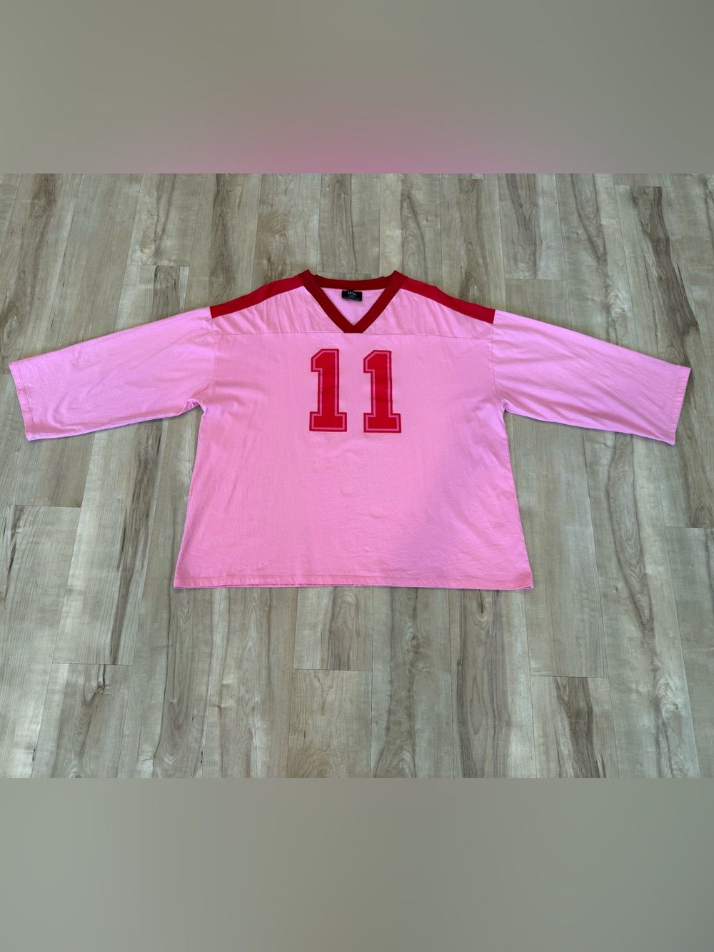 Dressed in Lala hockey jersey tee